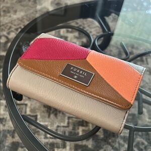 Fossil Pink, Orange, and Tan Leather Wallet with Modern Design